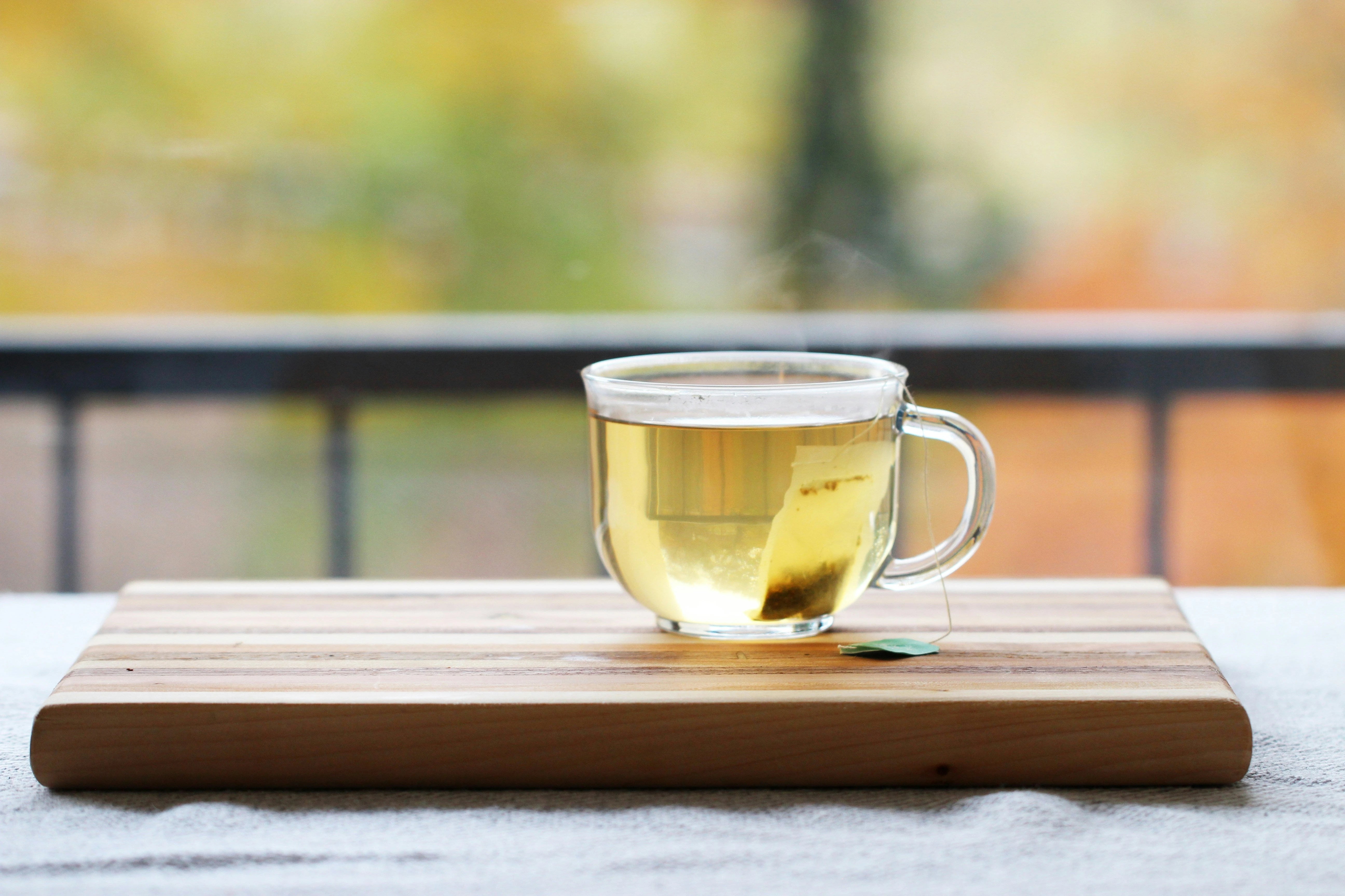 Tea cup on a wooden tray