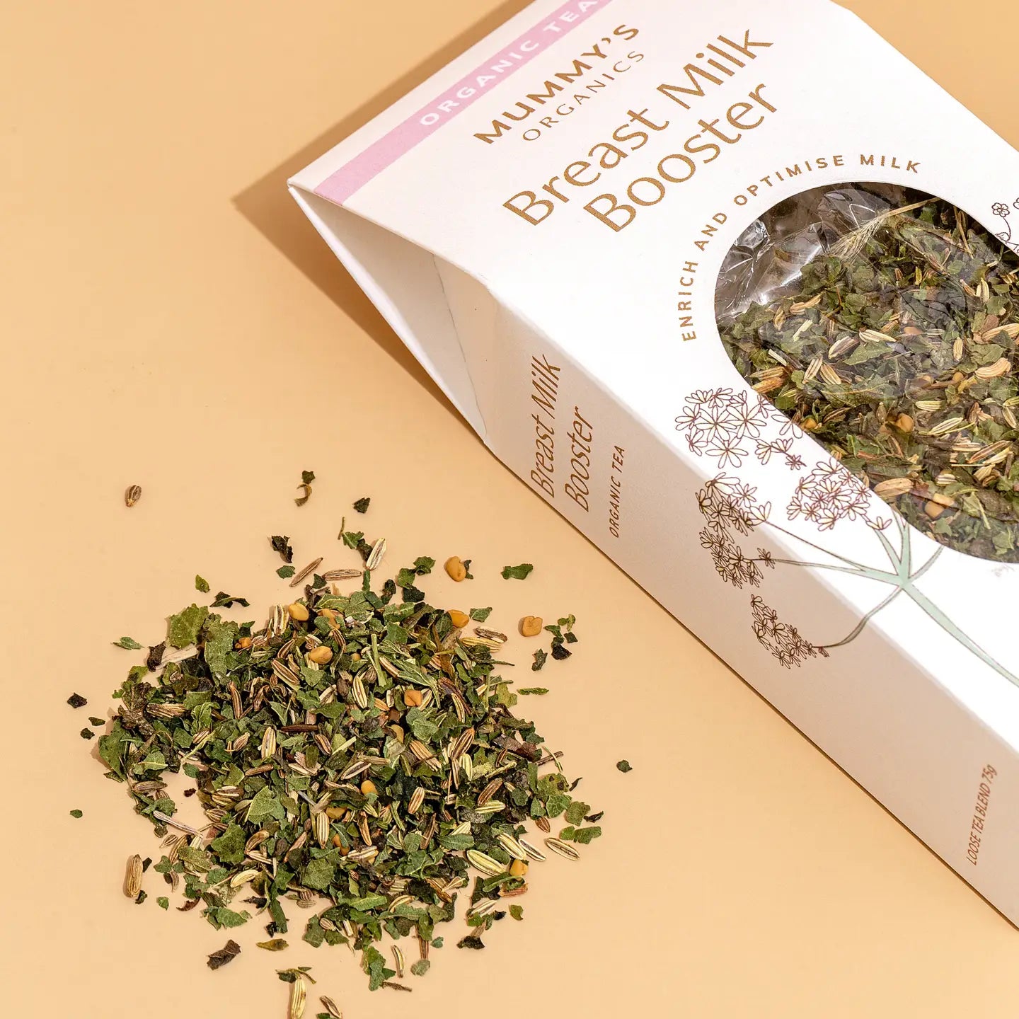 Mummy's Organics Breast Milk Booster packaging with loose tea on a beige background