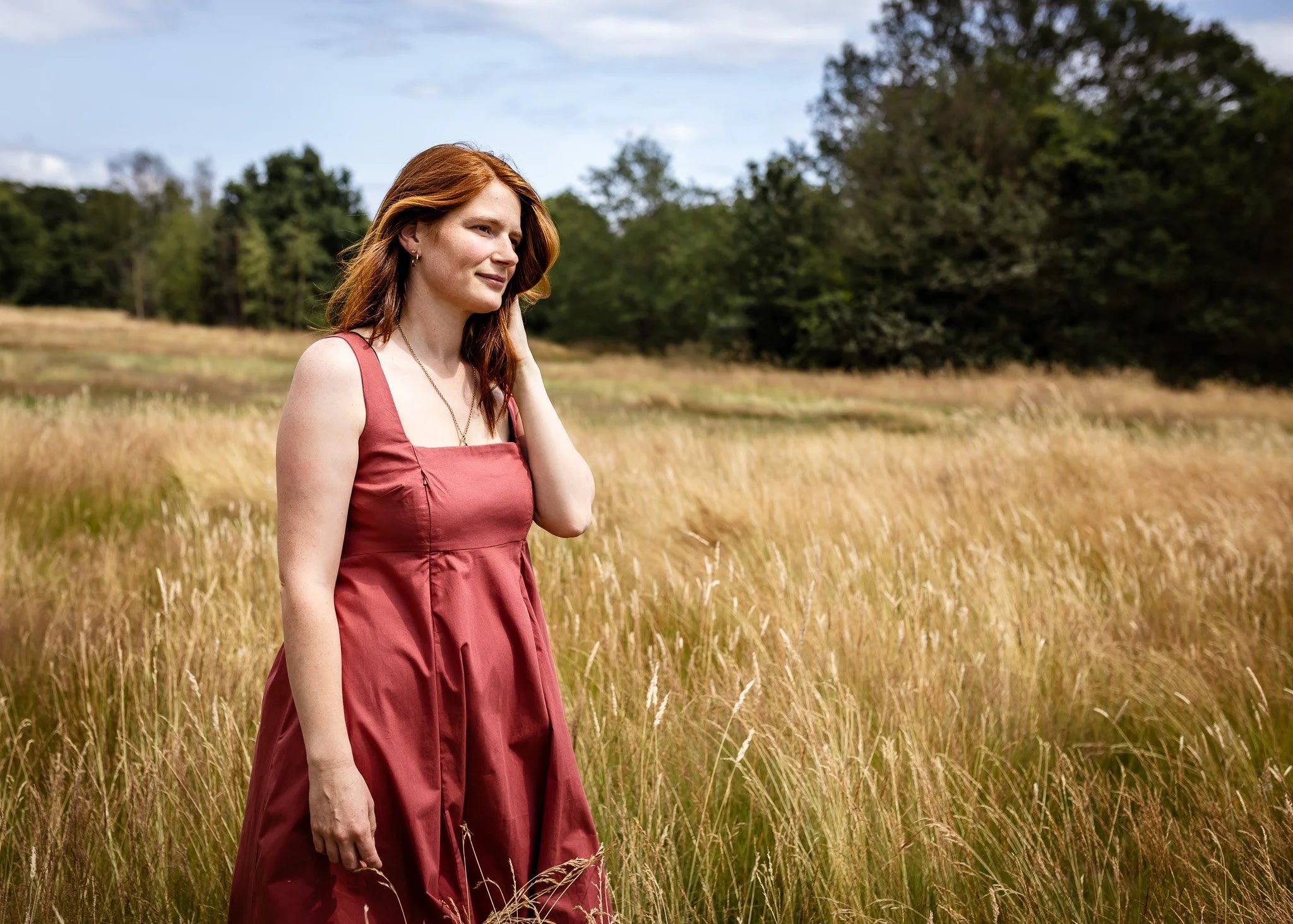 Nomadic Mother Megan Midi Dress in baked terracotta organic cotton — front view, nursing midi dress | Latchette